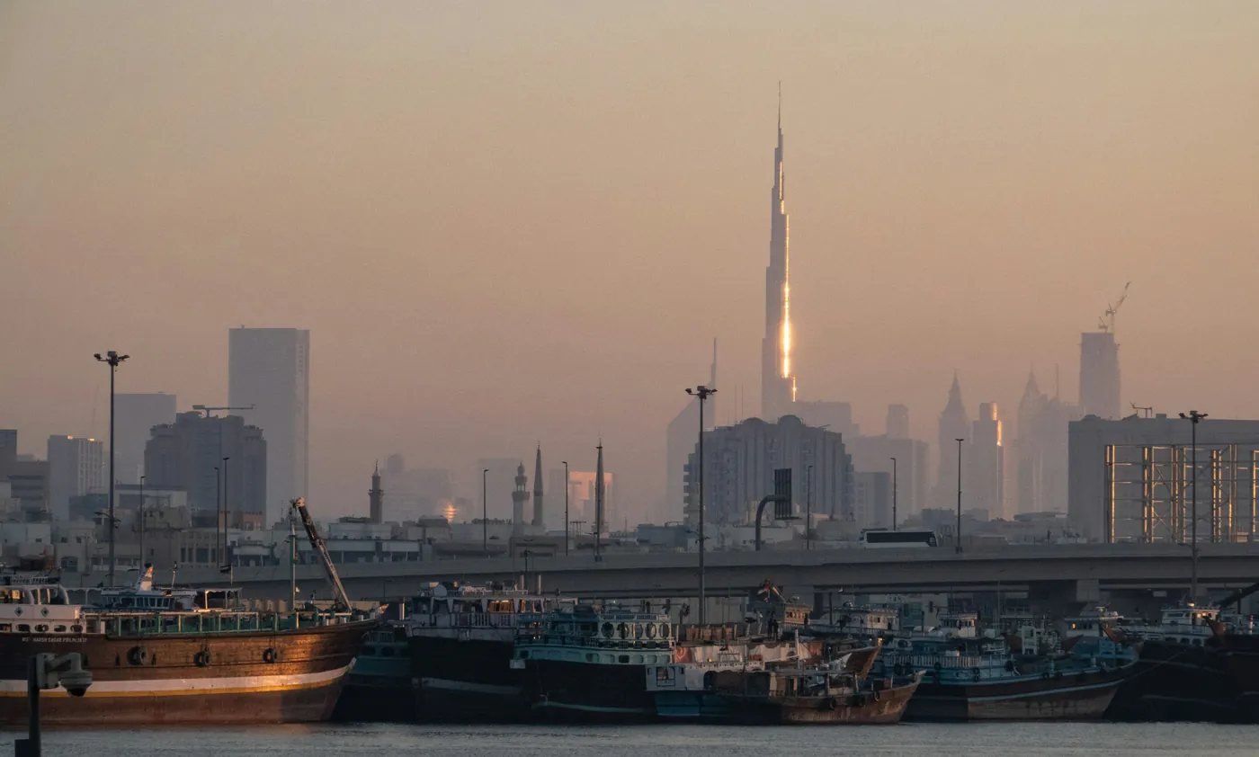 Dubai skyline and Burj Khalifa while comparing car rental services in the city