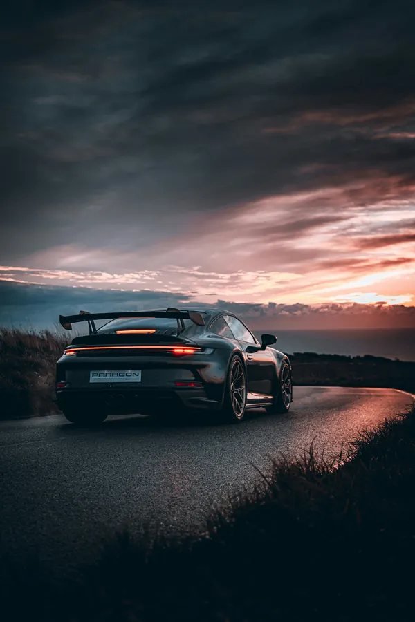 Supercar on an open road representing luxury car rental in Dubai